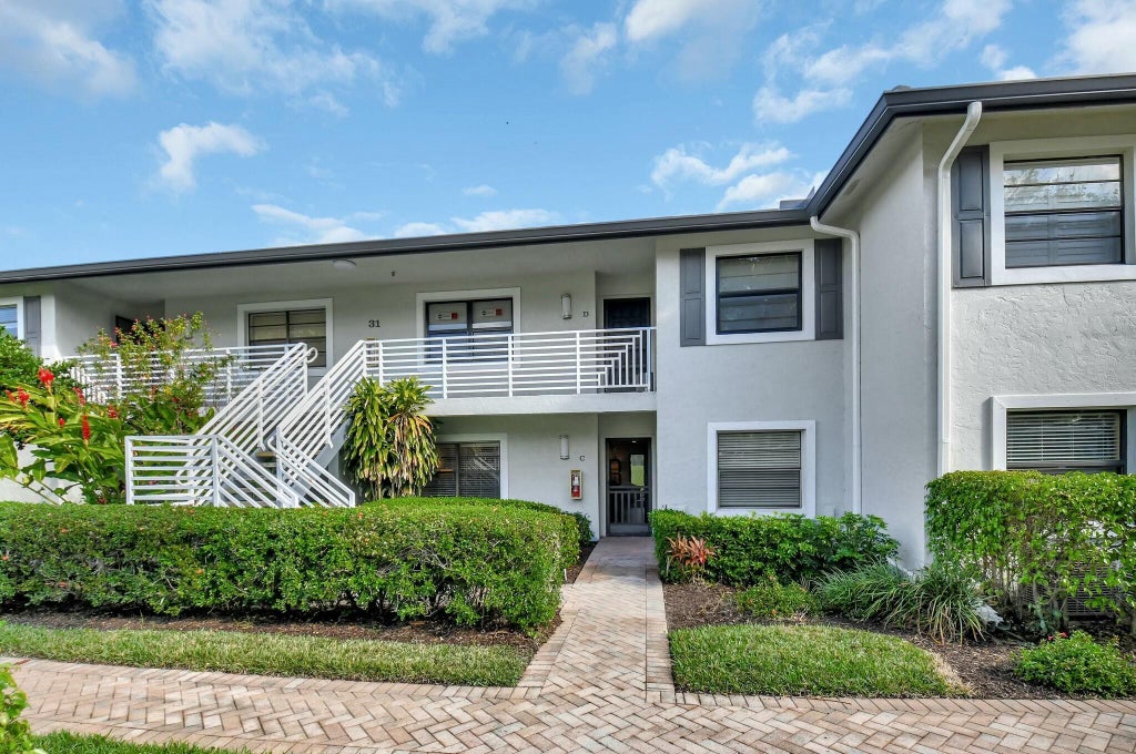 Photo of 31 Southport Lane #C, Boynton Beach, FL 33436 (MLS # R11059356)