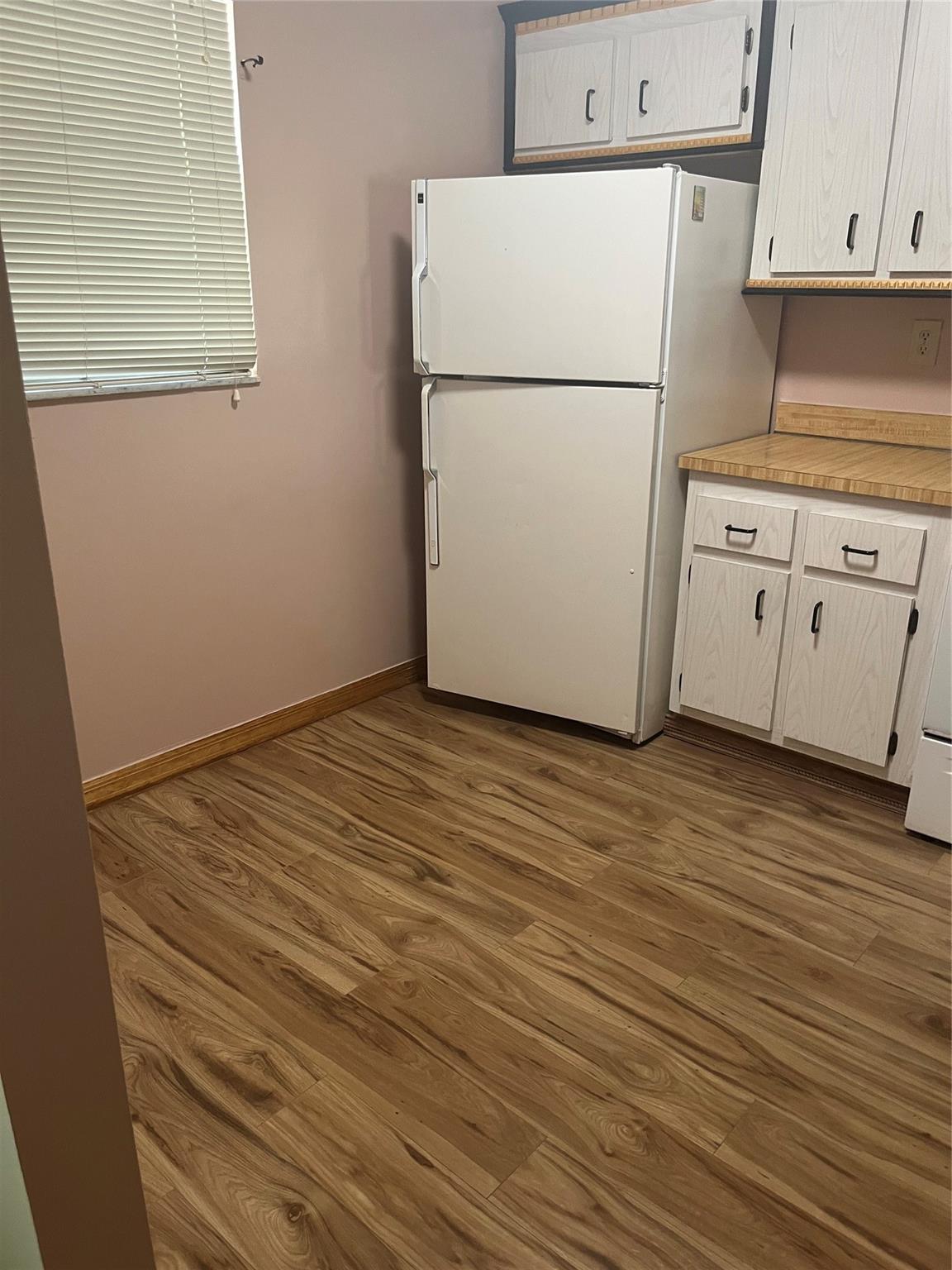 Investors dream totally remodeled wood floors no age or pet restrictions. Can be rented immediately. Gated clubhouse, pool