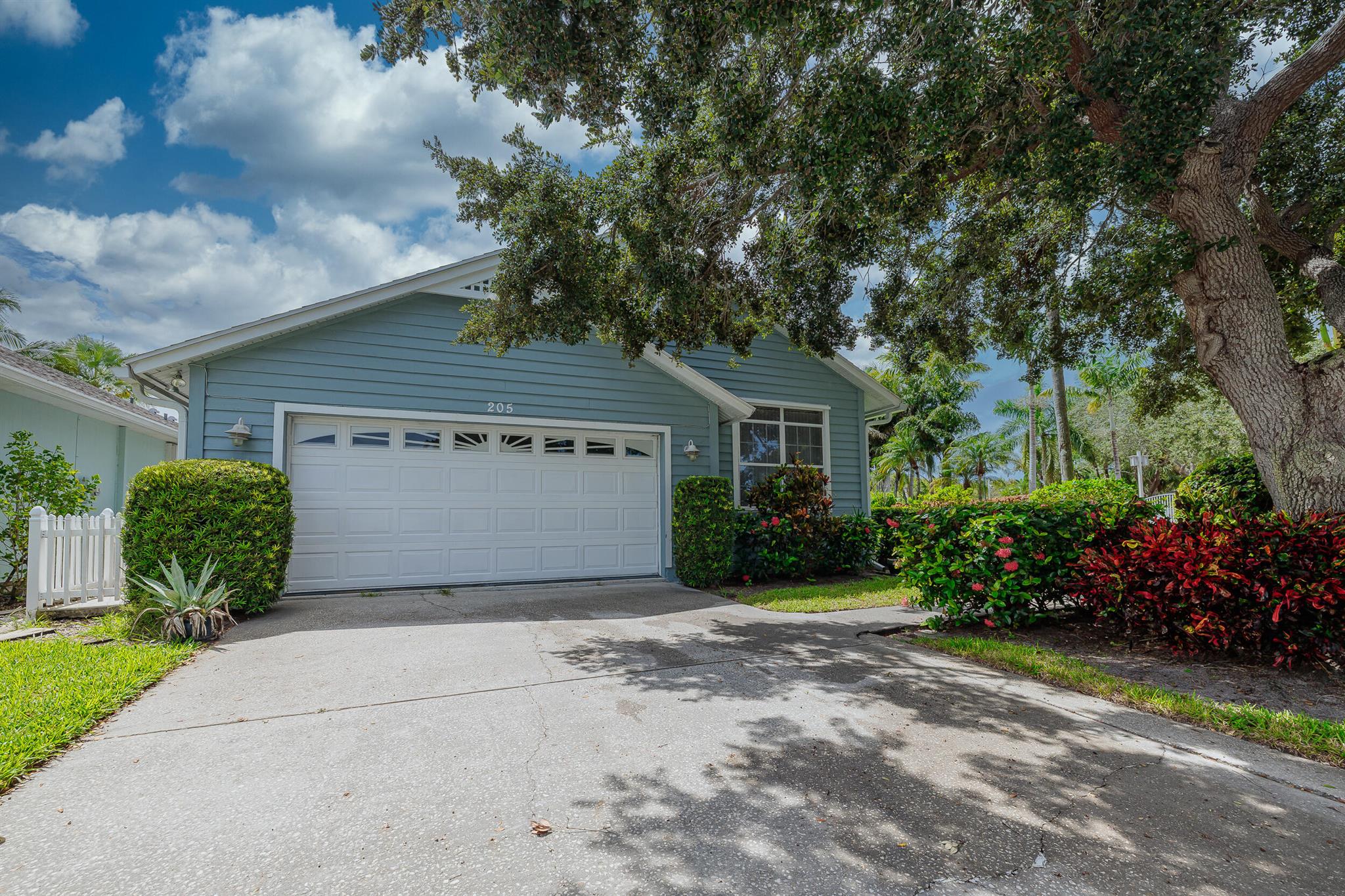 Welcome to Garden Grove, a peaceful gated community in Vero Beach. This charming 2-bedroom, 2-bath home with a den sits on a desirable corner lot & includes a 1.5-car garage for extra storage. A new roof was installed just 7 years ago, giving you peace of mind. Inside, you'll find a spacious kitchen with abundant cabinetry, perfect for storage & entertaining. The master suite offers dual sinks, a glass-enclosed shower & a relaxing soaking tub. Enjoy Florida living on the covered, screened patio, ideal for morning coffee or evening gatherings. Garden Grove residents enjoy wonderful amenities, including a clubhouse, community pool, & tennis courts. The property is perfectly situated near banking, shopping, restaurants & interstate access. Don't miss your chance to make it yours!