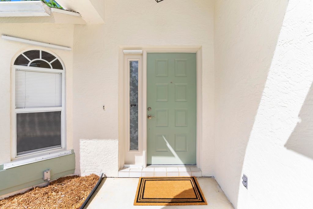 Photo of 1926 SW Gold Lane, Port Saint Lucie, FL 34953 (MLS # R11020437)