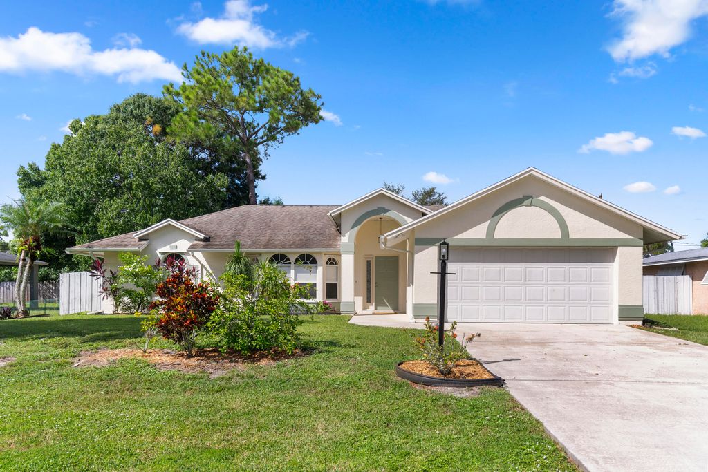 Photo of 1926 SW Gold Lane, Port Saint Lucie, FL 34953 (MLS # R11020437)
