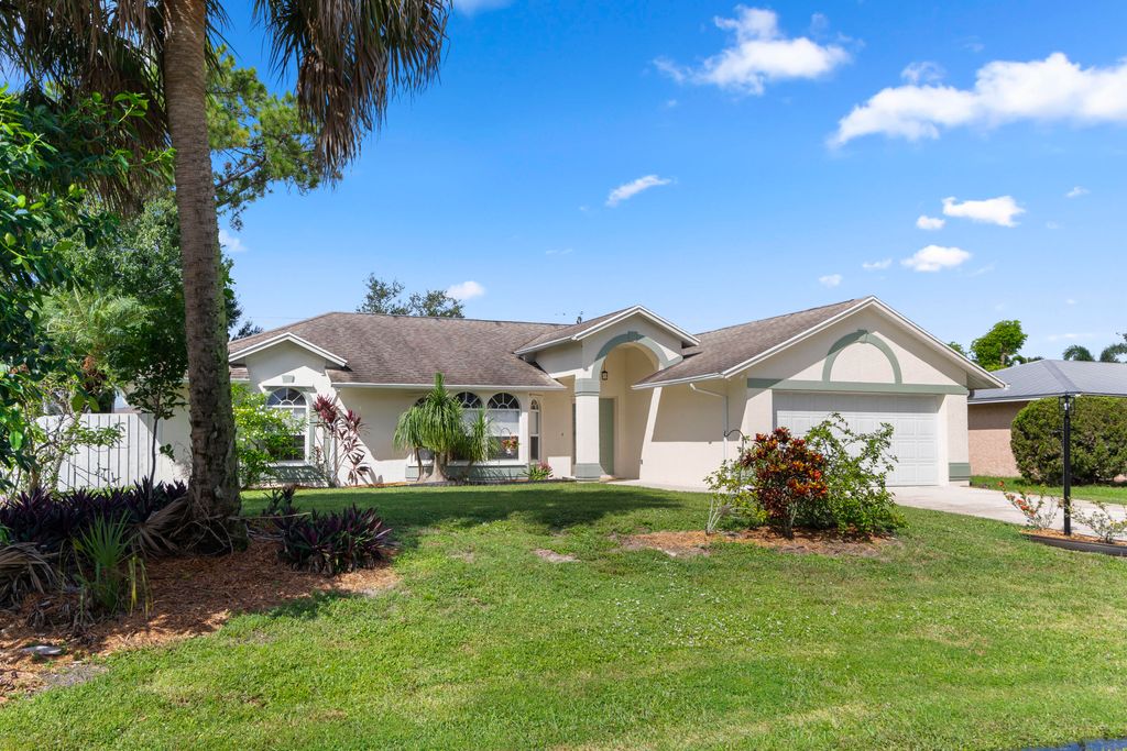 Photo of 1926 SW Gold Lane, Port Saint Lucie, FL 34953 (MLS # R11020437)