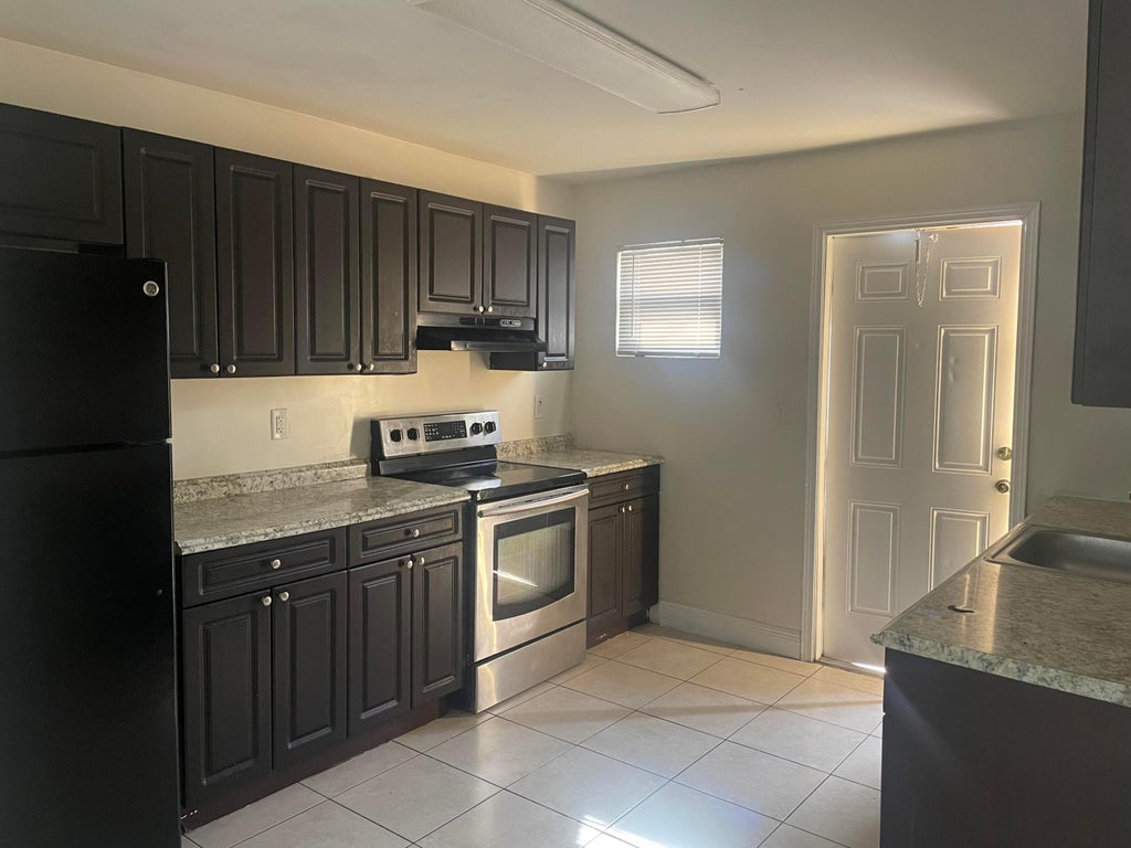 Photo of 2830 Avenue S #D1, Riviera Beach, FL 33404 (MLS # B26074730)