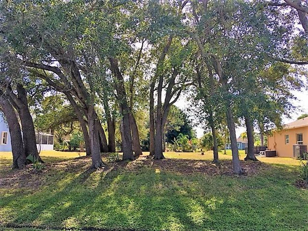 Photo of 1496 SW Merchant Lane, Port Saint Lucie, FL 34953 (MLS # R10685769)