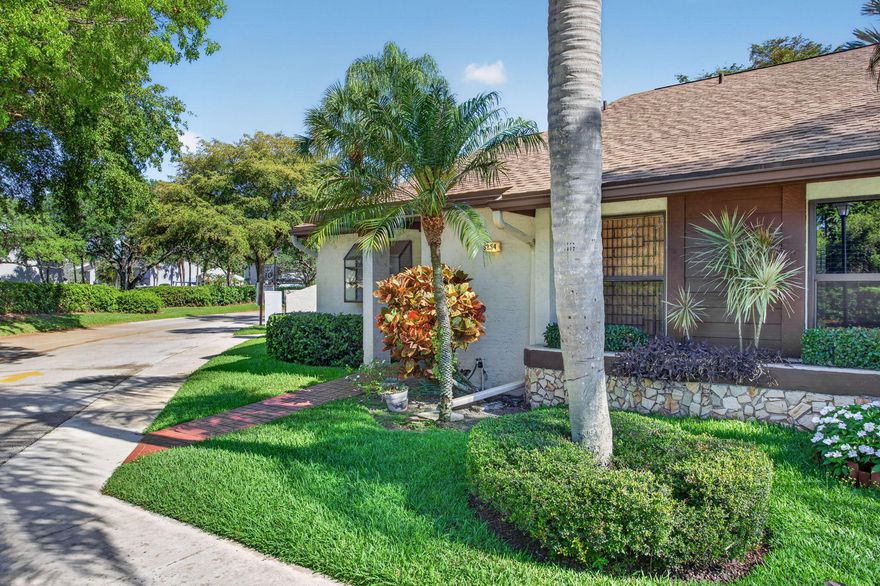 Welcome home to this beautiful move-in ready waterfront corner villa in Ginger Tree Villas, a highly desirable subdivision of the Township. This property has an open and inviting floor plan and lots of bells & throughout. Upgrades include a 2025 roof, updated kitchen w/ white shaker cabinets, granite countertops, & new stainless steel appliances, two updated bathrooms, fresh paint, neutral tile flooring throughout, custom closets, & a private laundry room.  Beautiful large glass enclosed patio overlooking the lake, perfect for entertaining.  Residents enjoy a peaceful community atmosphere w/ convenient access to parks, shopping, dining, major highways, & all that South Florida living has to offer. A wonderful opportunity to own in one of Coconut Creek's most convenient & charming locations
