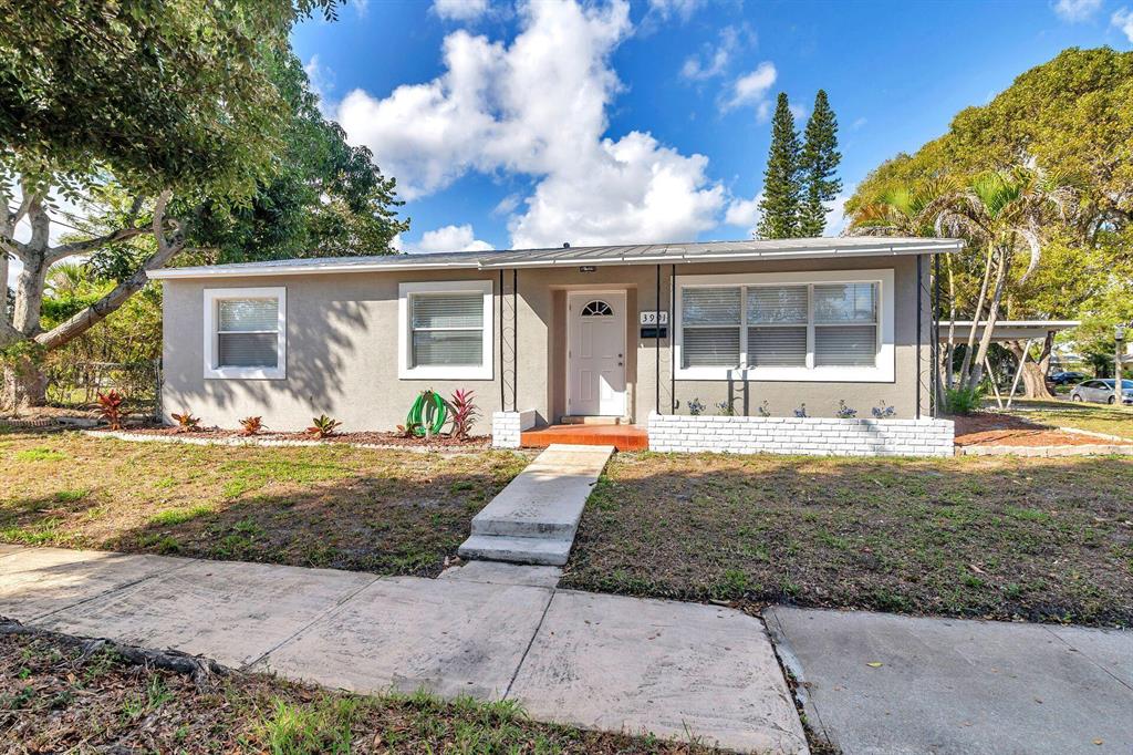 Recently renovated 3BR/1BTH Vedado Park home! This recently refinished home sits in the heart of West Palm Beach. Through the front door, the home opens up to the airy and bright living space. The home features new blonde wood laminate throughout. The kitchen boasts new countertops, large white shaker cabinets and all new appliances. The bath has been renovated with a new vanity and tile work. Beyond the kitchen there is a large enclosed Florida room that has washer/dryer. The Florida room can be used as a den or an office. Outdoors, the backyard is entirely fenced off and a great size for Florida living! Close proximity to Antique Row, The Warehouse District, The Art & Design District, Palm Beach Island, Palm Beach International Airport.