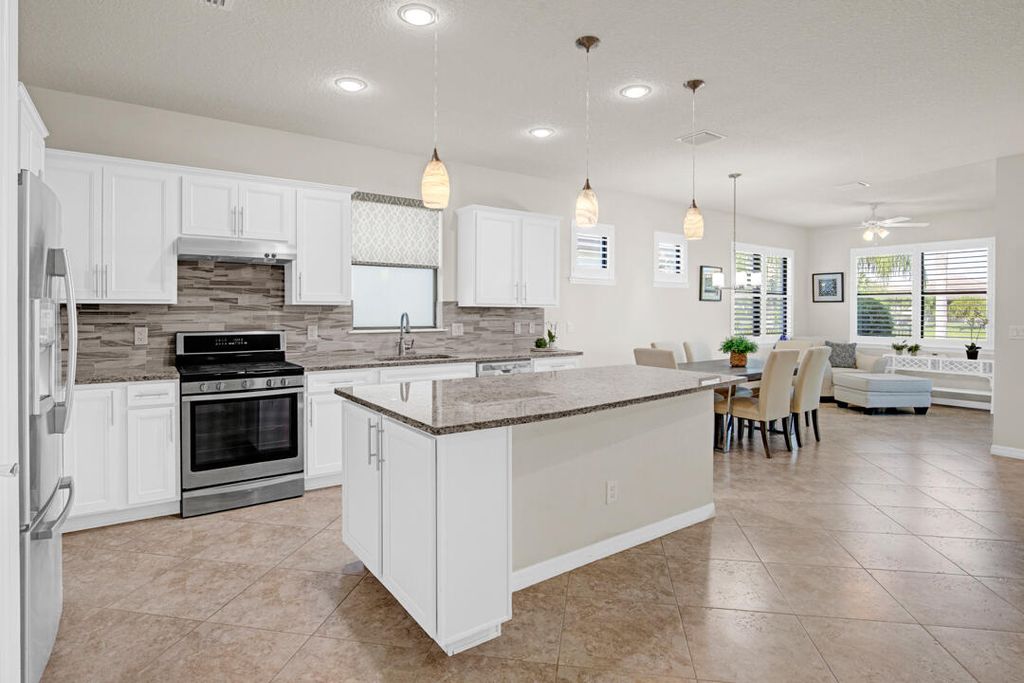 Photo of 649 SE Monteiro Drive, Port Saint Lucie, FL 34984 (MLS # R11099537)