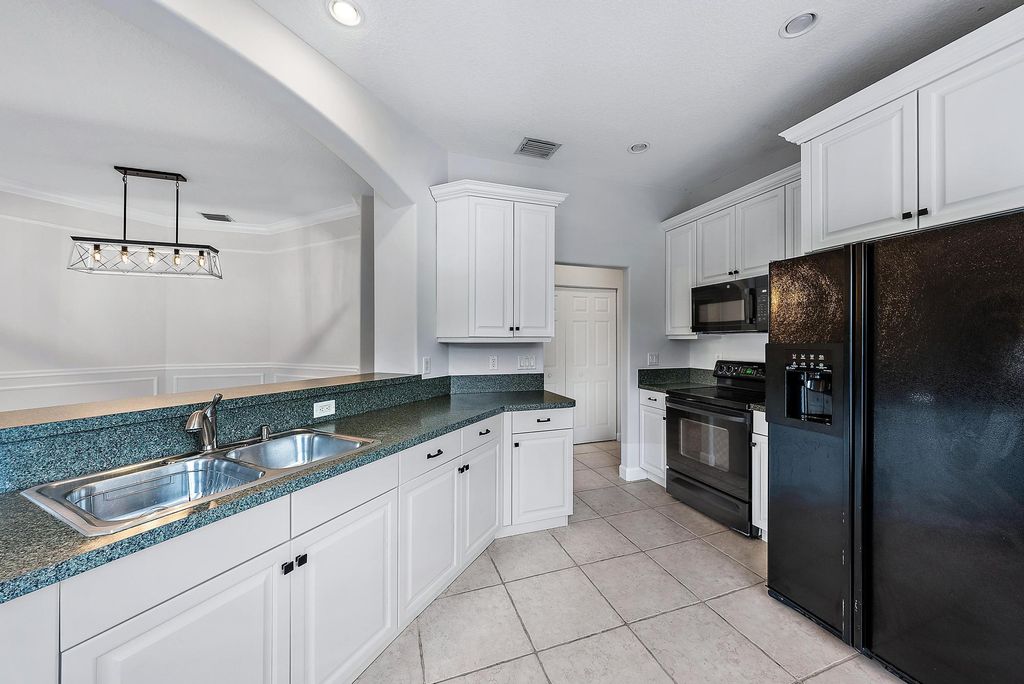 Photo of 2073 Cove Lane, North Palm Beach, FL 33408 (MLS # R10935982)