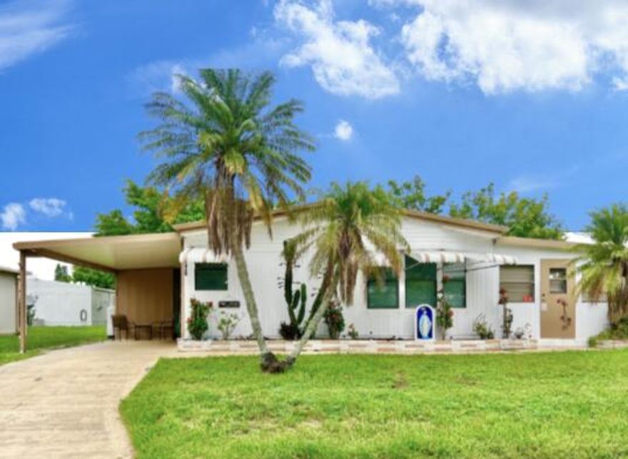 1984 40 x 24 Dble wide manufactured home w/ carport is ready for you! This well maintained 2 BR/2BA has an open floorplan w/ a bay window to let the natural light flow in! The extra surprise is the spacious 20' x 11' Florida rm w/ a/c that sits on a concrete foundation. This bonus area can be anything-lanai, exercise rm or den! A/C 2021, Microwave 2021, Gas Stove w/ 2024 tank, 2018 Water htr., orig. roof has been cleaned & sealed annually. This home comes w/ 2 storage sheds PLUS an extra large shed w/ a/c & lock! Maralago Cay comm. is very active. HOA incl. lawn care, front sprinkler irrigation, clubhouse, fitness ctr., tennis, pools, game rm, library, bocce ball, shuffleboard & mthly activity calendar. Park offers boat/RV parking in sep. area & food pantry for residents in need.