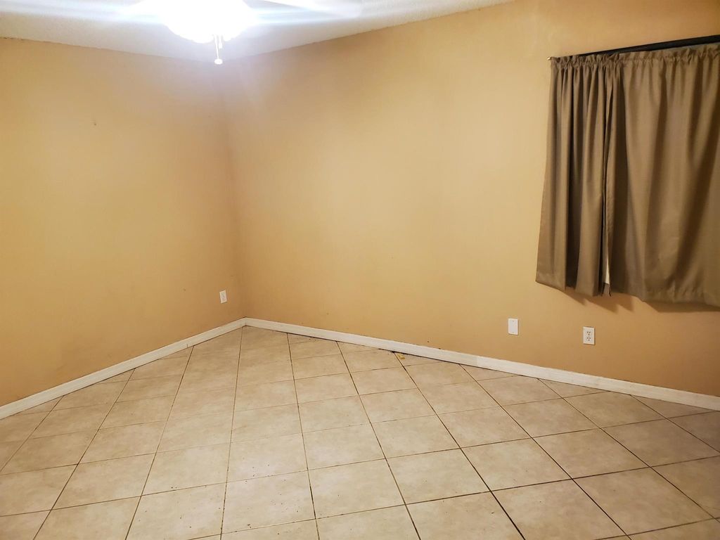 Photo of 5709 SE Normandy Avenue, Stuart, FL 34997 (MLS # R10990292)