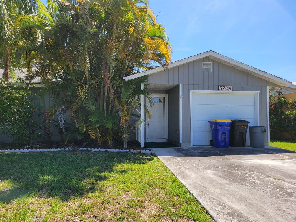 Photo of 5709 SE Normandy Avenue, Stuart, FL 34997 (MLS # R10990292)