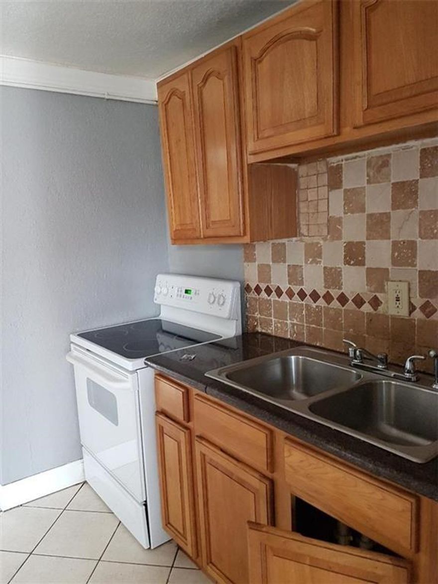 Previous Buyer unable to obtain Financing, but good luck for you! and  No HOA! A Place of your own! and yes start the New Year with a new Large home with 4 bedrooms and 2 bathrooms. OPPORTUNITY ZONE PROPERTY which gives TAX ADVANTAGES to the buyer, it is a tax deferral program. Zoned Residential MultiFamily -12 Freshly painted and Deep Cleaned with terrific neighbors in a great upcoming Pompano area. Large Fenced yard. Separate Laundry area. Closets in every room. Central a/c Front porch Patio directly in front of the home. Property is in a coveted Opportunity Zone. A few short miles to the beach. Seller reserves the right to leave the property on the market 12 business days before reviewing offers.