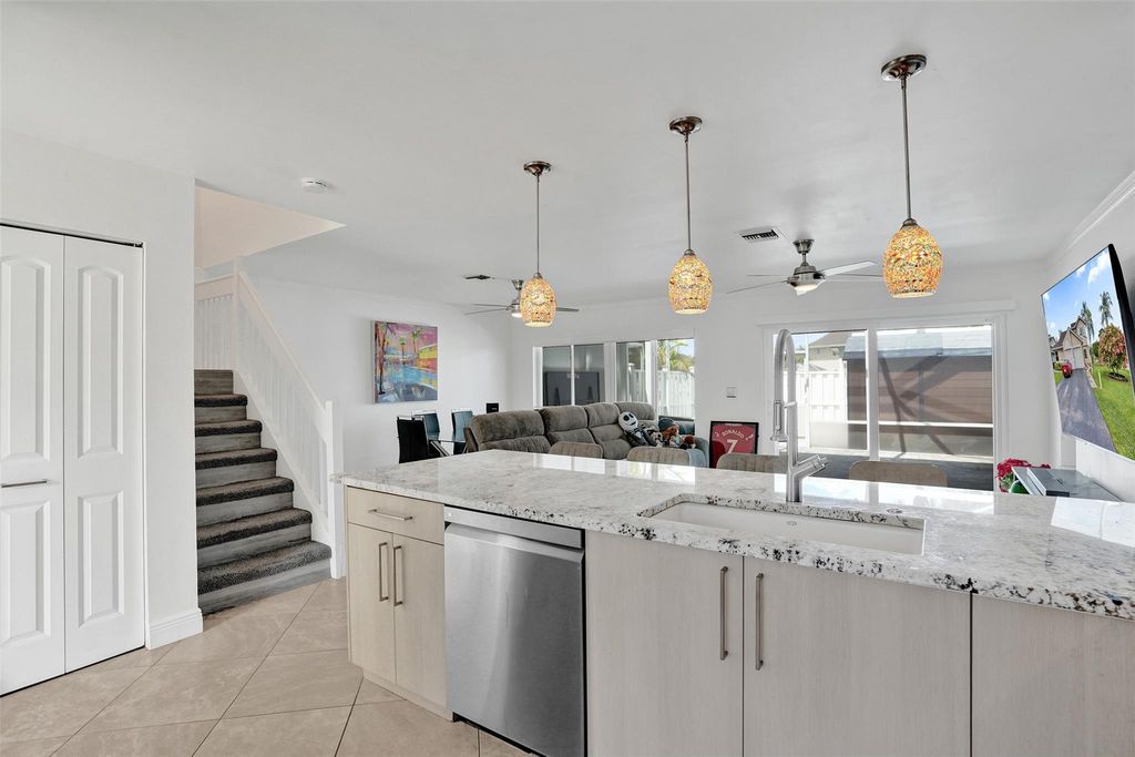 Photo of 1235 NW 51st St, Deerfield Beach, FL 33442 (MLS # F10542549)