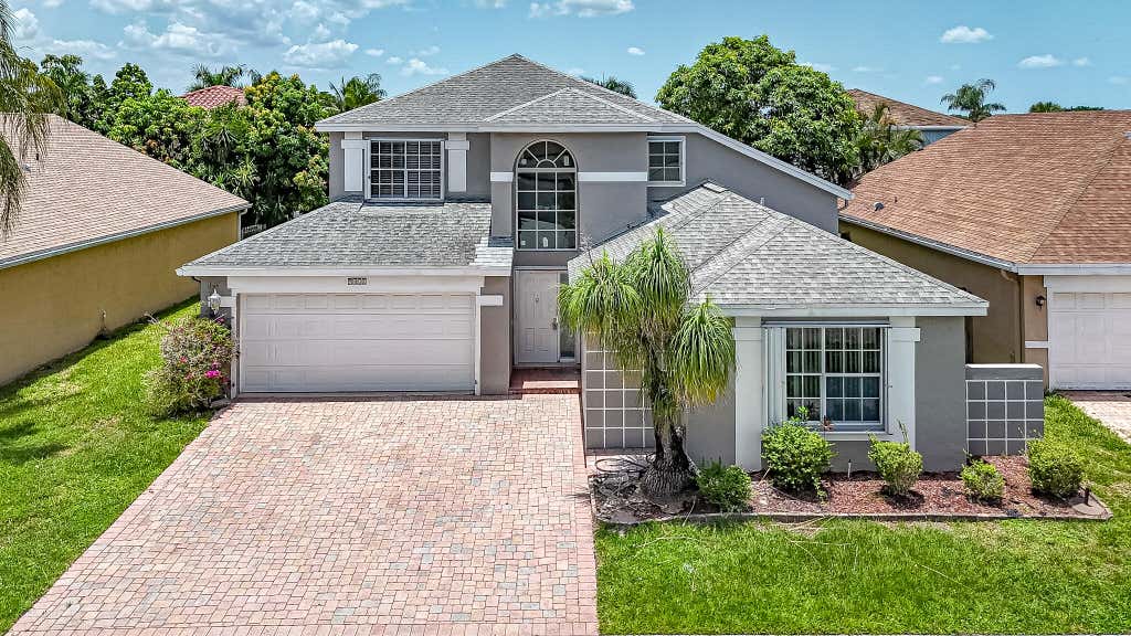Photo of 9401 Aegean Drive, Boca Raton, FL 33496 (MLS # B26052046)