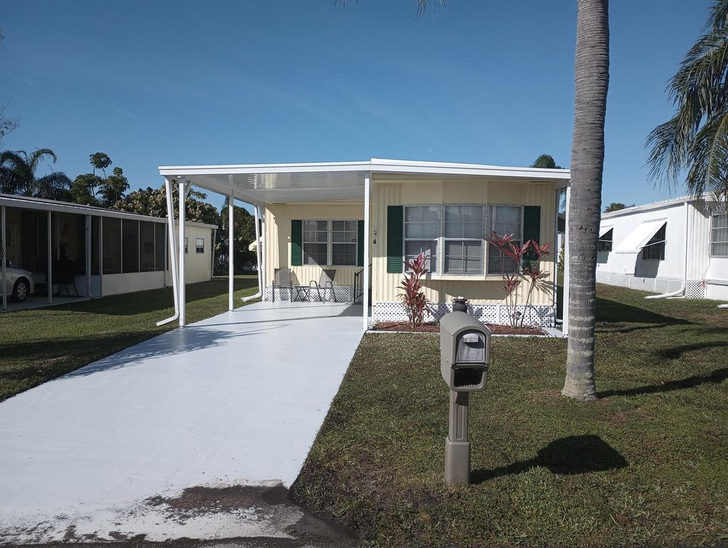 Photo of 4 Placido Lane, Port Saint Lucie, FL 34952 (MLS # R11046956)