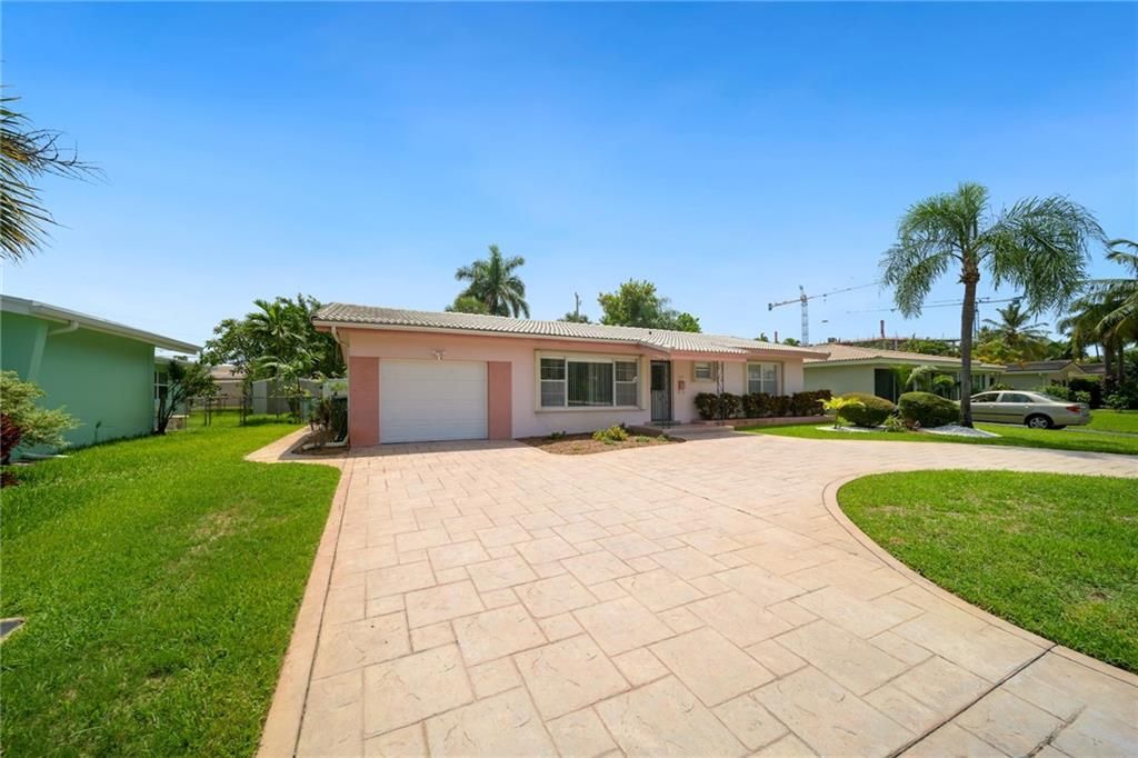 Photo of 3374 NE 19th Ave Ave, Oakland Park, FL 33306 (MLS # F10335061)