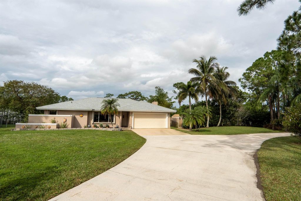 Photo of 12545 75th Lane N, West Palm Beach, FL 33412 (MLS # R10948469)