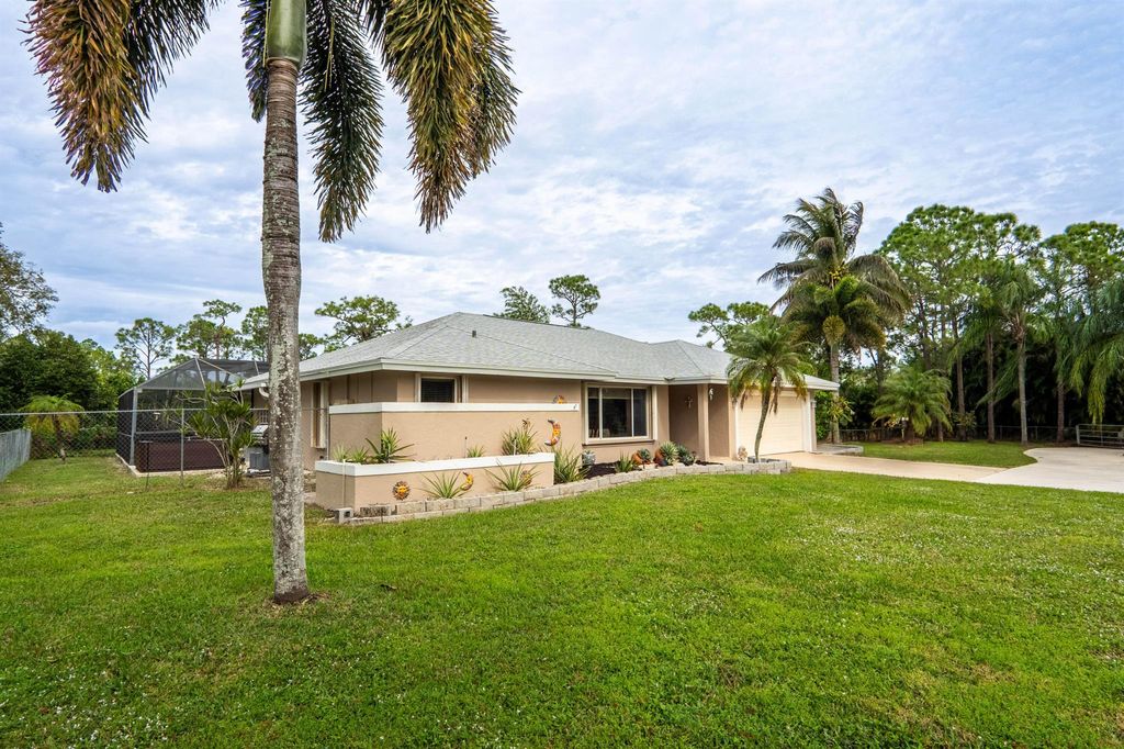 Photo of 12545 75th Lane N, West Palm Beach, FL 33412 (MLS # R10948469)