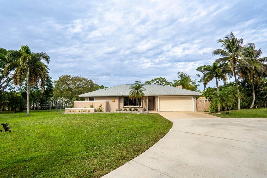 Photo of 12545 75th Lane N, West Palm Beach, FL 33412 (MLS # R10948469)