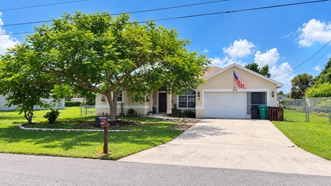 Photo of 824 SW Java Avenue, Port Saint Lucie, FL 34953 (MLS # B26090733)