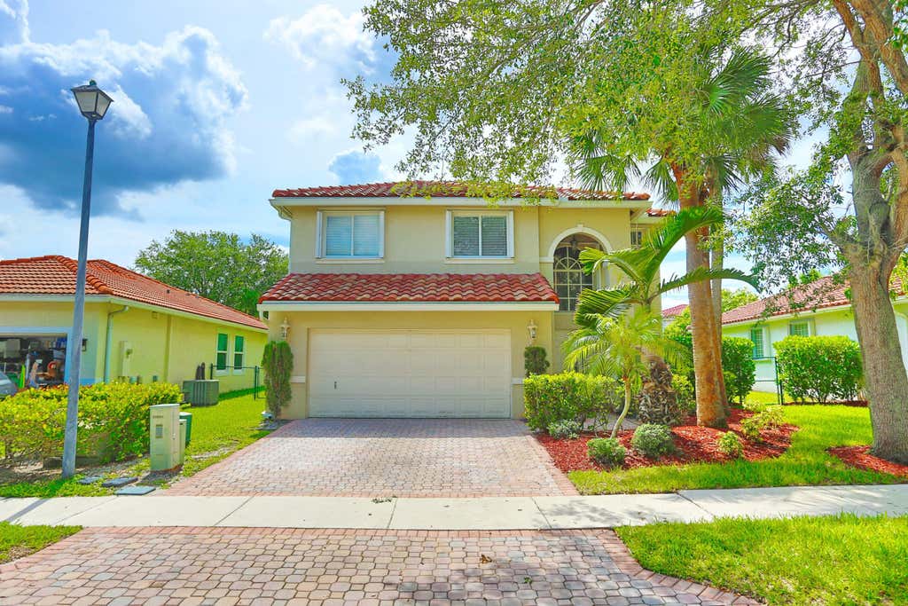 Photo of 5157 NW 122nd Avenue, Coral Springs, FL 33076 (MLS # B26049842)