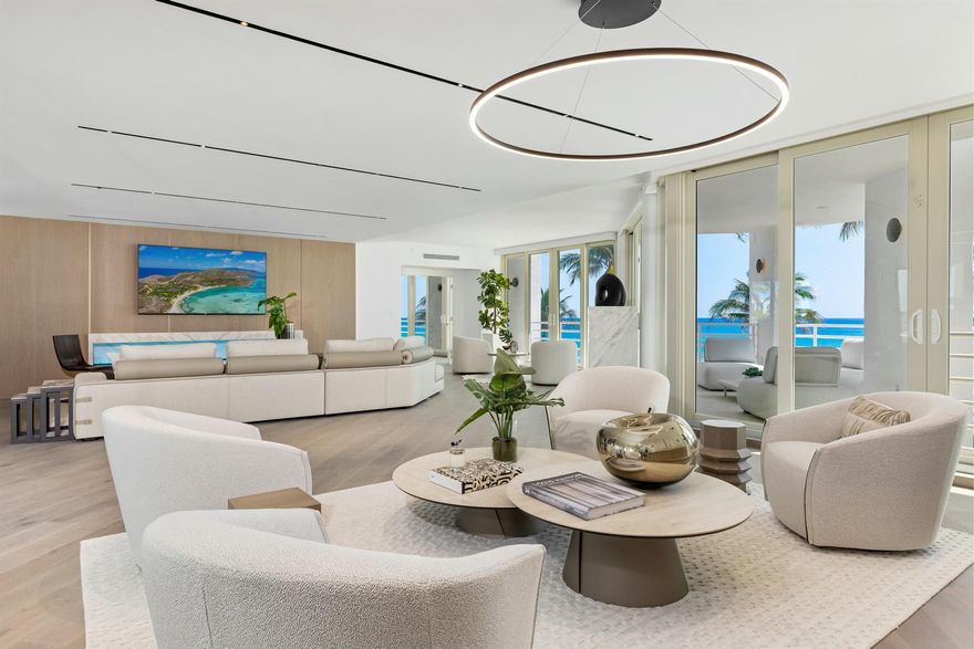 Welcome to Residence 205 at the exclusive Presidential Place--an oceanfront masterpiece that redefines coastal luxury. Expertly reimagined by award-winning designers Michael Gray and Lori Keezer, this meticulously renovated condominium offers an immediate sense of elegance and an effortlessly luxurious lifestyle.Spanning an impressive 4,747 square feet of living space, this prestigious condominium features 4 spacious bedrooms, 4.5 lavish bathrooms, and a dedicated private office, seamlessly blending form and function. Floor-to-ceiling glass reveals breathtaking direct ocean views, while expansive living and entertaining areas exude sophistication at every turn.