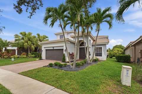 Photo of 12339 NW 77th Manor, Parkland, FL 33076 (MLS # B26048054)