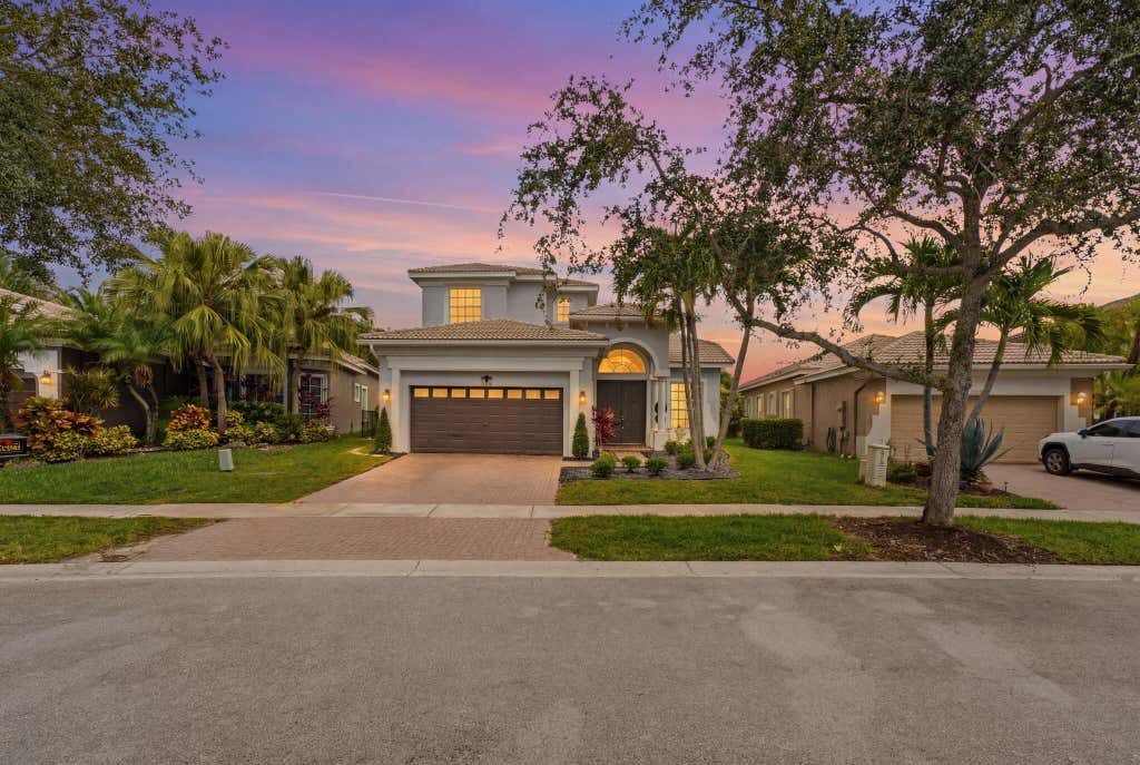 Photo of 12339 NW 77th Manor, Parkland, FL 33076 (MLS # B26048054)