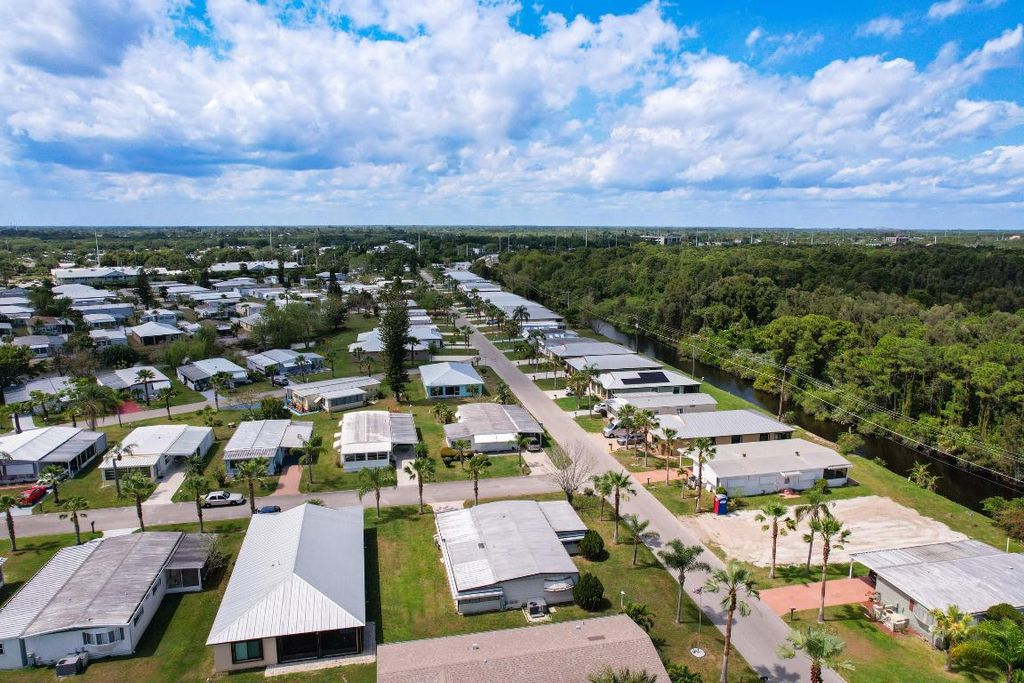 Photo of 16 SE Casa Rio Road, Port Saint Lucie, FL 34952 (MLS # R10971293)