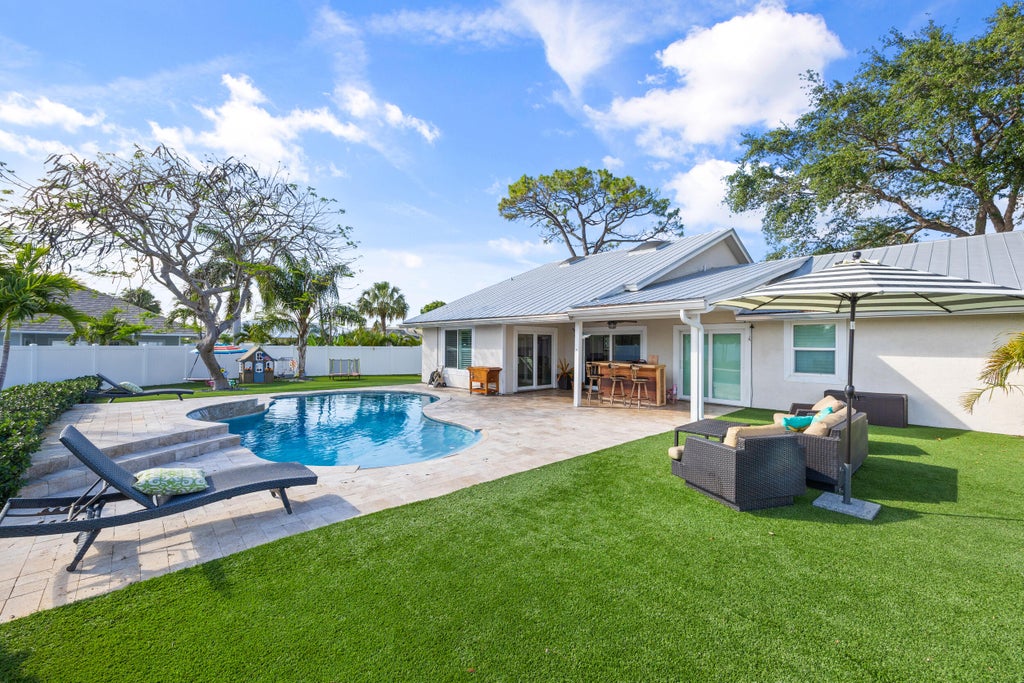 Photo of 15 Hemlock Lane, Tequesta, FL 33469 (MLS # R11063600)