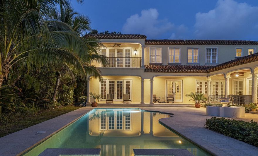 Under the shade of mature oaks and cypress trees is a piece of Italy in Sewall's Point. Located on a private drive in North Sewall's Point on a rare piece wide waterfront land, Villa Loggia was crafted as an escape to the Mediterranean. Deep water access will allow the largest of vessels. Downstairs, a mahogany clad office holds a thrilling secret: A temperature-controlled wine cellar welcomes your collection. Kitchen is the heart of the home with double island, family table area, and living. An elevator brings you one of the largest owner's suites in Sewall's Point. Grand closet, spacious bath, abundant storage, and walkout balcony. En-suite bedrooms with sitting area complete the upstairs. Full impact windows and doors, true 3 car garage, generator, large laundry and rod storage. Grand