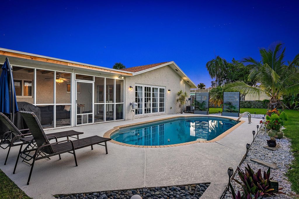 Photo of 3931 Flag Drive, Palm Beach Gardens, FL 33410 (MLS # R11107087)