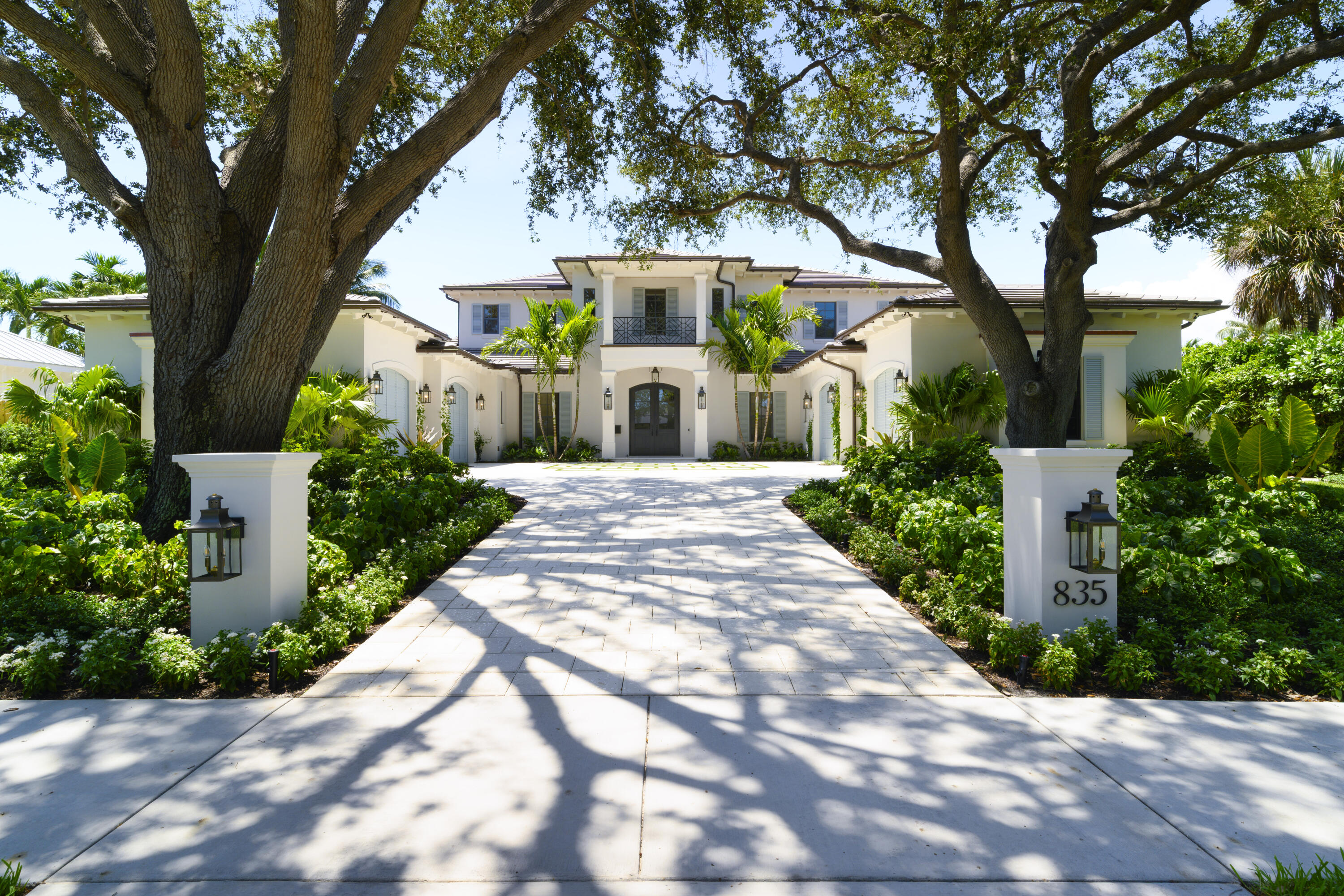 ''The Hammock'' Estate located at 835 Country Club Drive in the sought after Village of North Palm Beach is the latest from RJS Builders. 8,924 total sq ft and 5,770 sq ft under air. 6 bedroom, 7 baths, office, cabana, guest casita, 94 feet of water frontage, dock, pool and spa. Custom details of Marble, hardwood floors, hand-selected finishes, and old-world charm with a fresh, modern twist. Step outside to a beautiful backyard with a summer kitchen, cozy cabana with fireplace, and a guest casita perfect for guests or quiet retreats.