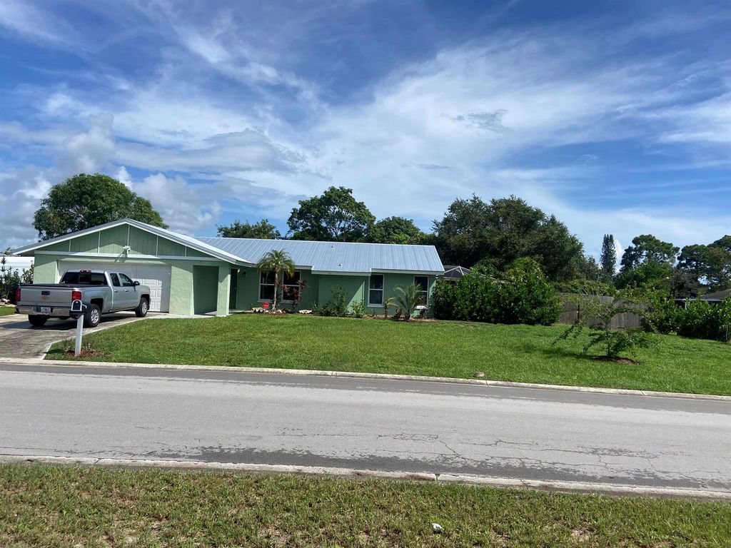 Photo of 1301 SE Mohave Street, Port Saint Lucie, FL 34952 (MLS # R11017955)