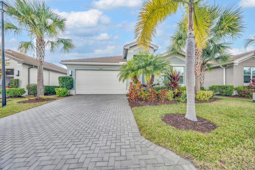 Welcome to 12127 SW Jasper Lake way in beautiful Port Saint Lucie, a 2019 lakefront home in a sought-after 55+ community with lawn care included. Enjoy peaceful water views and maintenance-free living. This well-maintained home With 2 spacious bedrooms, 2 full baths + a den. Features impact windows throughout & added recessed lighting for a bright, modern feel. No carpet, tile flooring throughout. Both baths offer shaded shower windows; guest bath has a walk-in shower and the primary bath features full mirrors. Upgraded kitchen with full backsplash and extended cabinetry. Water softener, hard-wired smoke alarms, and plantation blinds. Resort-style, Residents enjoy an impressive lineup of amenities • Basketball • Bike & Jog Paths • Billiards • Pool • Café/Restaurant • Clubhouse •  Fitne