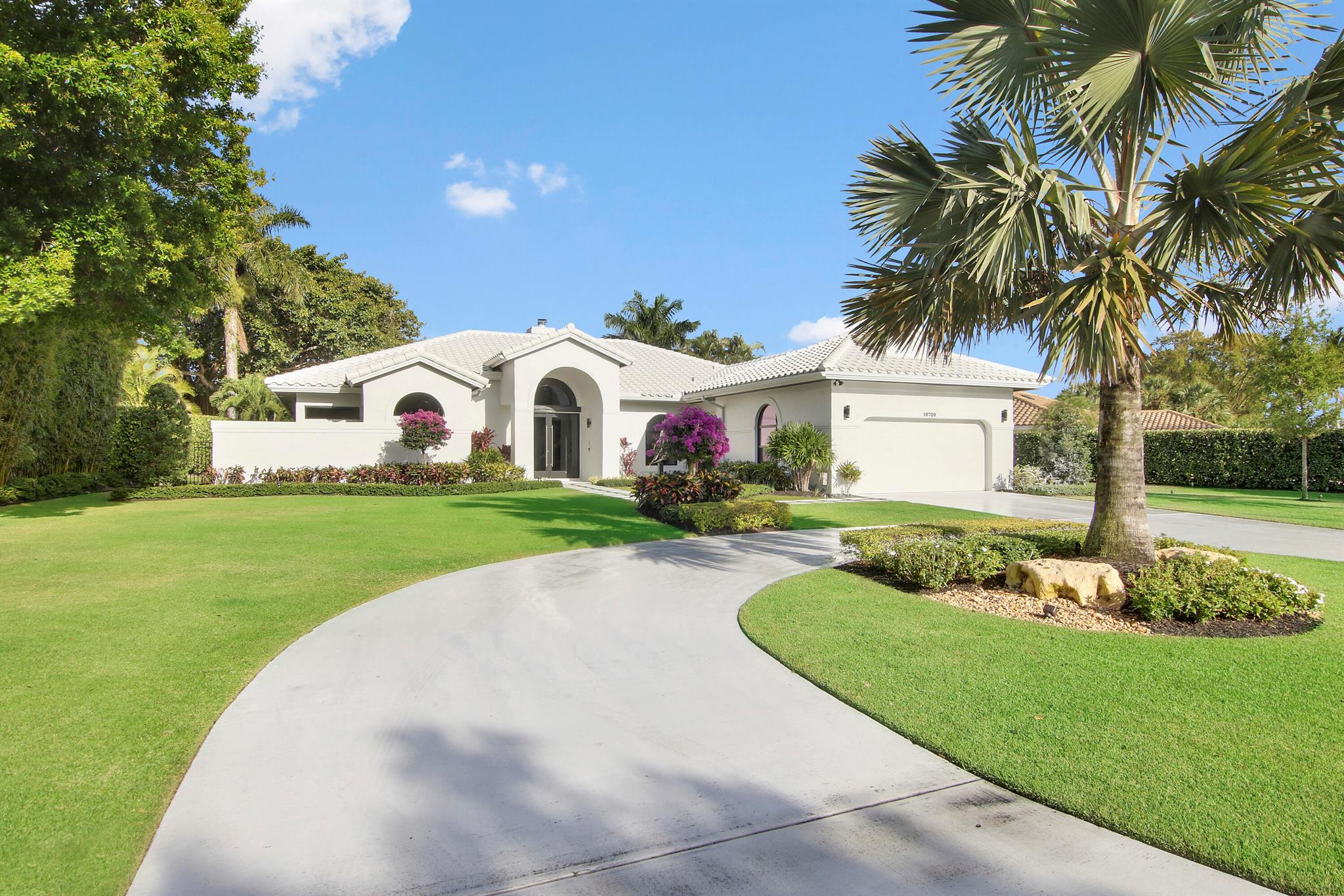 Prepare to be impressed! No expense was spared to create a lavishly remodeled resort style property! New pool and spa with remote control app and salt water system 2021. New landscaping pavers, golf course grass and architectural landscape lighting with app to control. New aluminum fencing. Impact rated windows and doors. Private backyard and views of the BallenIsles 18th hole of the East course. Professionally designed and decorated. Ring camera system. Thermador stove and cooktop. GE Monogram refrigerator matches the cabinets. Wine wall in the dining room. Lighted, coffered ceilings in the master bedroom and dining room. Putting green in the backyard. Enjoy the amazing sunrises and Eastern breezes. Fully furnished negotiable. Available for rent $10,000/month annual furnished.