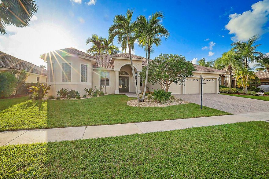 Discover fine living in the highly coveted gated community of Boca Falls! This stunning 4-bedroom plus a den/office or bonus room, 3-bathroom with a 3-car garage combines timeless design with modern convenience. Inside, you'll find soaring high ceilings, tile flooring throughout, and a desirable split floorplan that offers both privacy and functionality. The open-concept kitchen features granite countertops, stainless steel appliances, and abundant cabinet space. The oversized primary suite includes a spacious walk-in closet and spa-inspired bathroom. There are 2 A/C units 2020 and 2021 Enjoy the outdoor screened-in patio and private backyard lined with Clusia hedges for privacy.