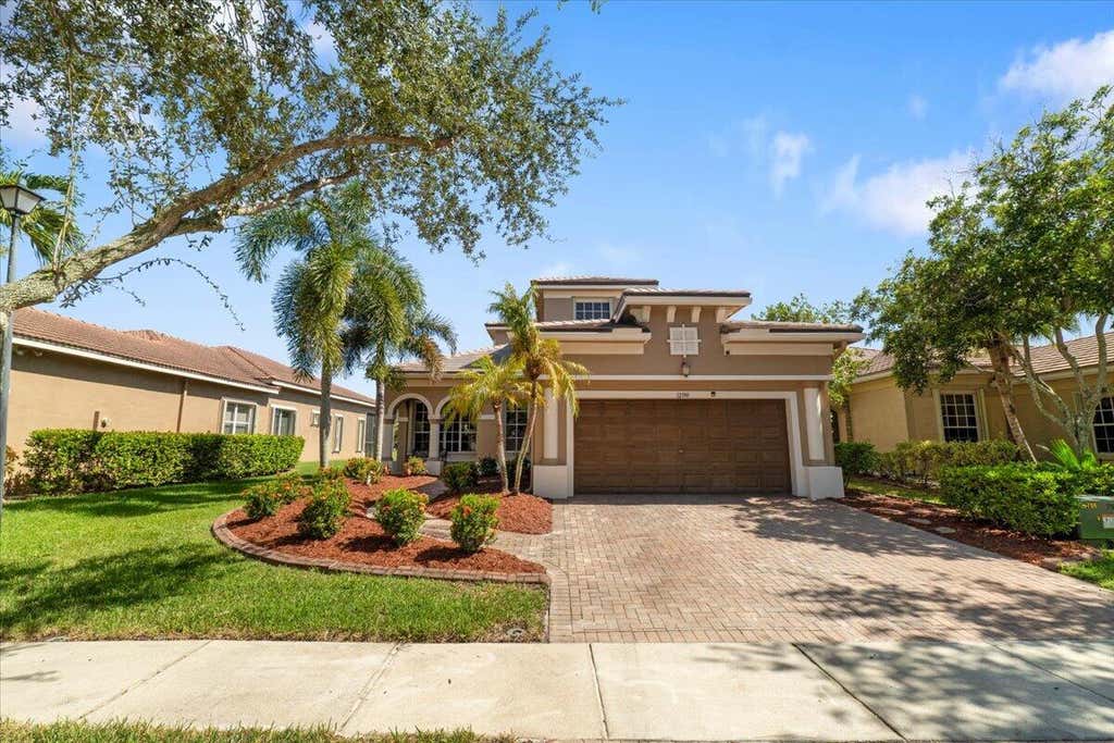 Photo of 12390 NW 78TH Manor, Parkland, FL 33076 (MLS # B26066618)