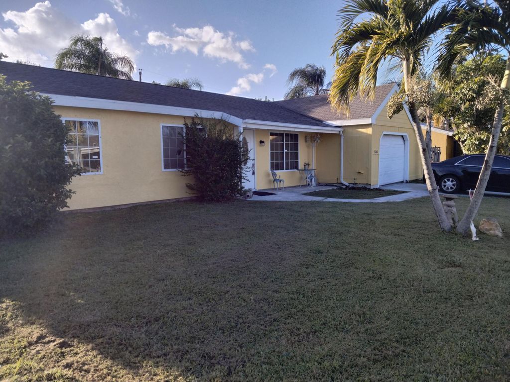 Photo of 2342 SE Midtown Road, Port Saint Lucie, FL 34952 (MLS # R11126221)