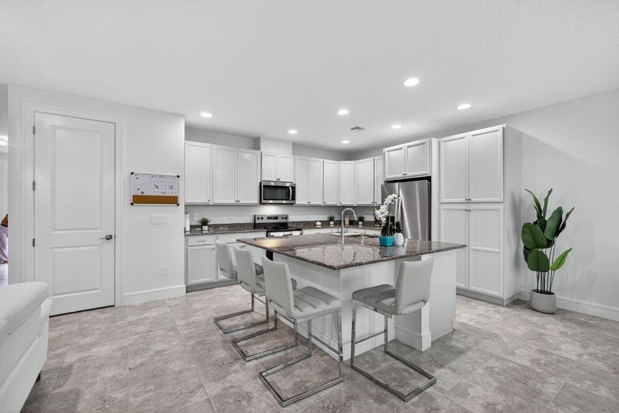 Modern Townhome in The Crossings at Westlake.
Welcome to this stunning 3-bedroom, 2.5-bath townhome, built in 2024 and thoughtfully enhanced with stylish upgrades and finishes. From the moment you step inside, you'll appreciate the attention to detail and modern design touches that make this home move-in ready. The spacious open floor plan is complemented by fresh designer paint, new baseboards, upgraded door casings, and sleek modern switch plates, creating a clean and contemporary look throughout. The primary bedroom features upgraded ceilings and walls, adding a touch of elegance and sophistication to your private retreat. Additional upgrades include epoxy flooring in the garage for durability and style, and impact windows throughout, offering peace of mind and energy efficiency. Life at Westlake means more than just a beautiful home...it means resort-style living at its finest. Whatever your favorite style of recreation, you'll find it at the Westlake Adventure Park. Swim in the lagoon pool, glide down the tower slide, or keep fit in the lap pool. Little ones will love the splash pad and adventure playground, while adults can relax in the shade or gather on the expansive lawns for parties and celebrations. With basketball courts, a dog park, an outdoor concert pavilion, and more, the amenities are truly unmatched, making Florida's new city the perfect place to call home.