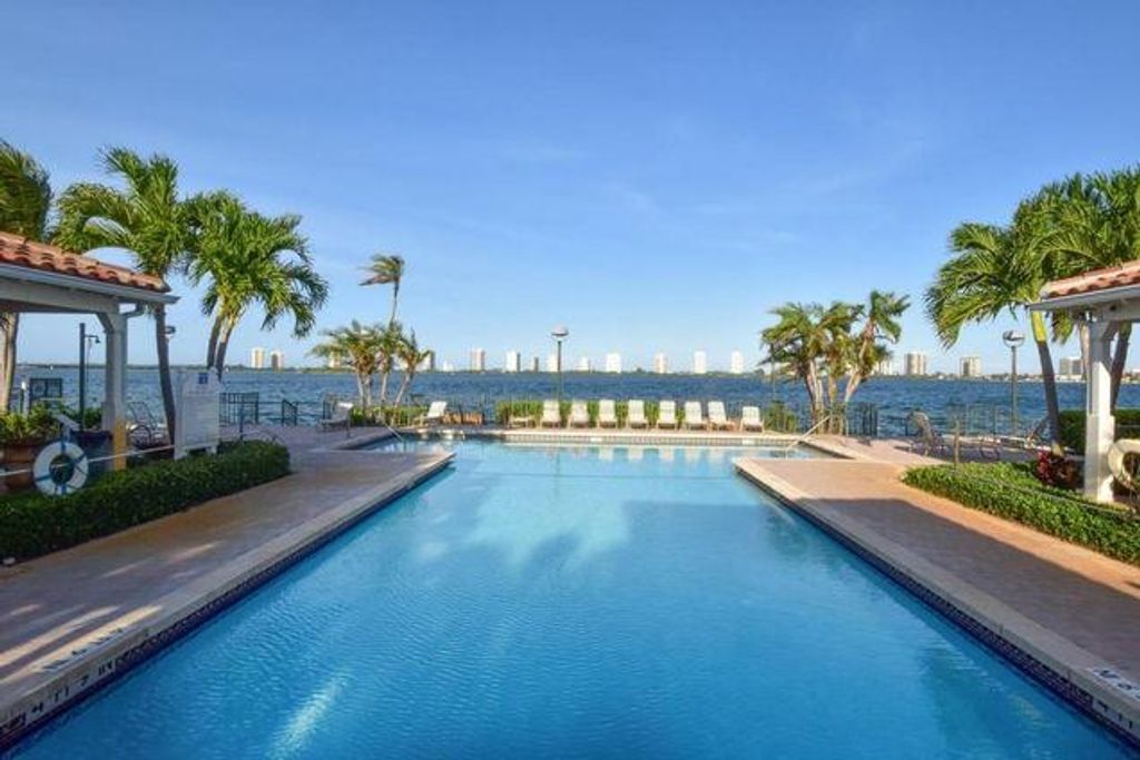 Photo of 1125 Lake Shore Drive #205, Lake Park, FL 33403 (MLS # R10686012)