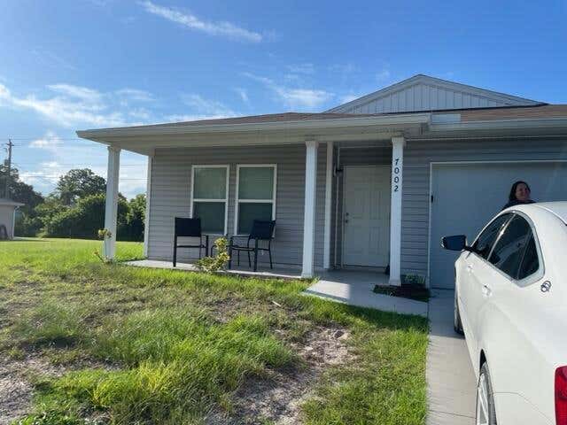 Photo of 7002 Penny Lane, Fort Pierce, FL 34951 (MLS # R10897608)