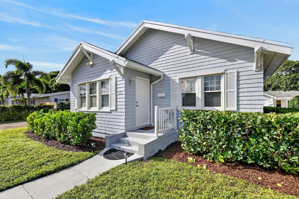 Photo of 415 Greenbriar Drive, West Palm Beach, FL 33403 (MLS # B26078630)