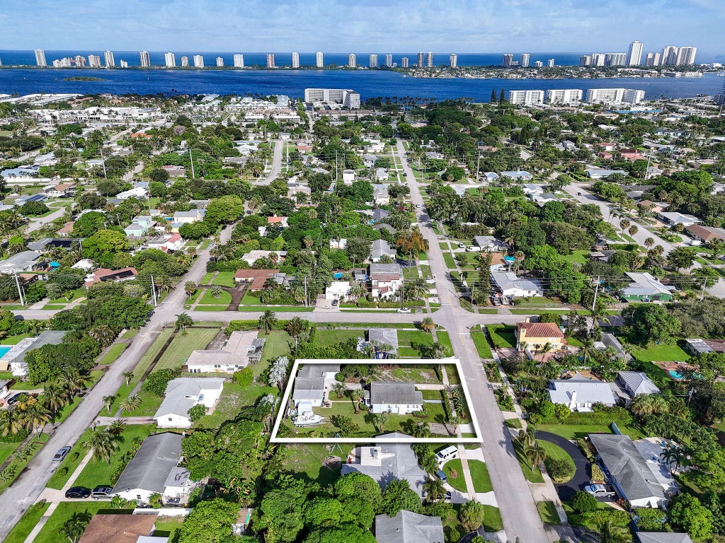 Photo of 415 Greenbriar Drive, West Palm Beach, FL 33403 (MLS # B26078630)