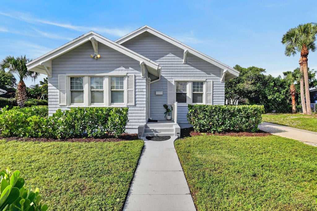 Photo of 415 Greenbriar Drive, West Palm Beach, FL 33403 (MLS # B26078630)