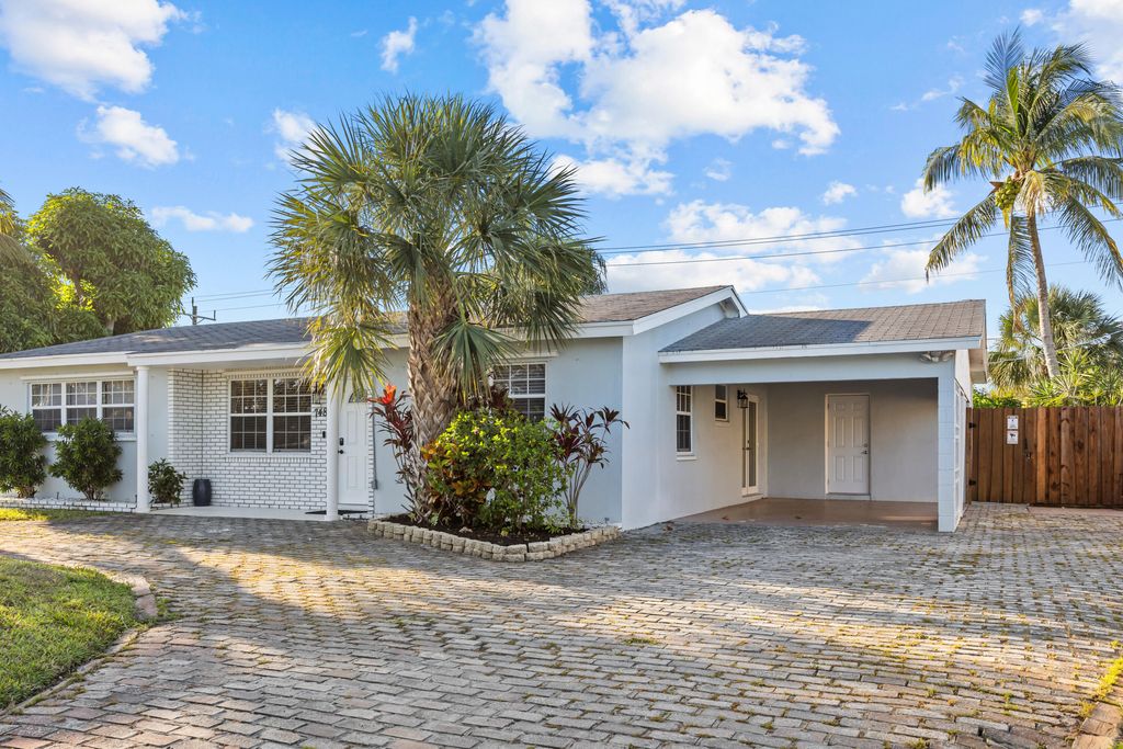 Photo of 748 W Jasmine Drive, Lake Park, FL 33403 (MLS # R11084172)