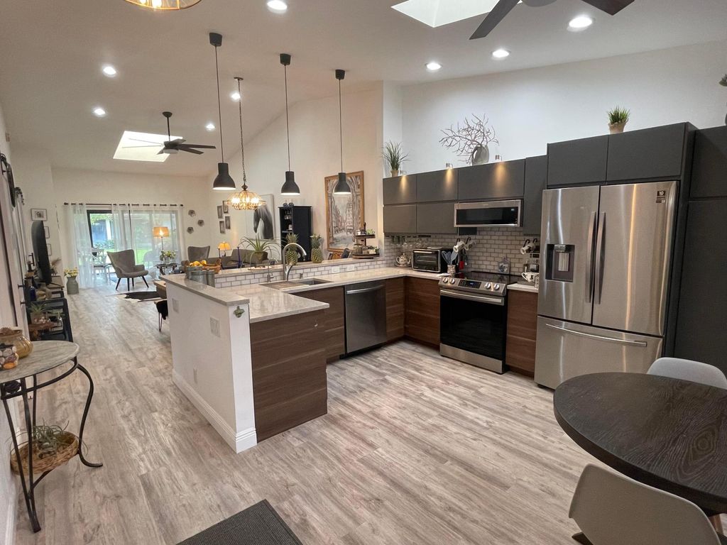 Photo of 6379 Kings Gate Circle, Delray Beach, FL 33484 (MLS # R10945075)