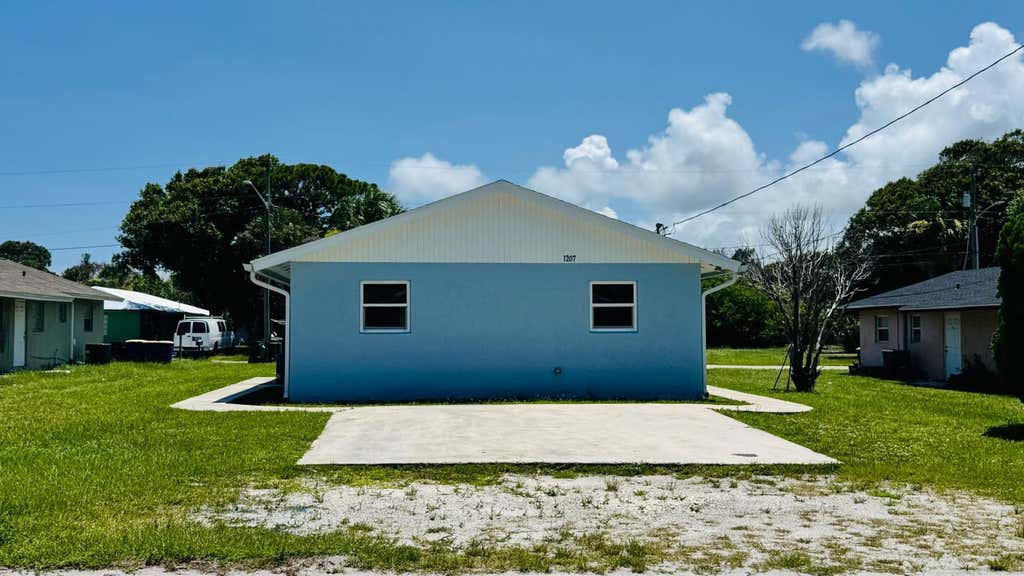 Photo of 1207 Avenue K, Fort Pierce, FL 34950 (MLS # B26055859)