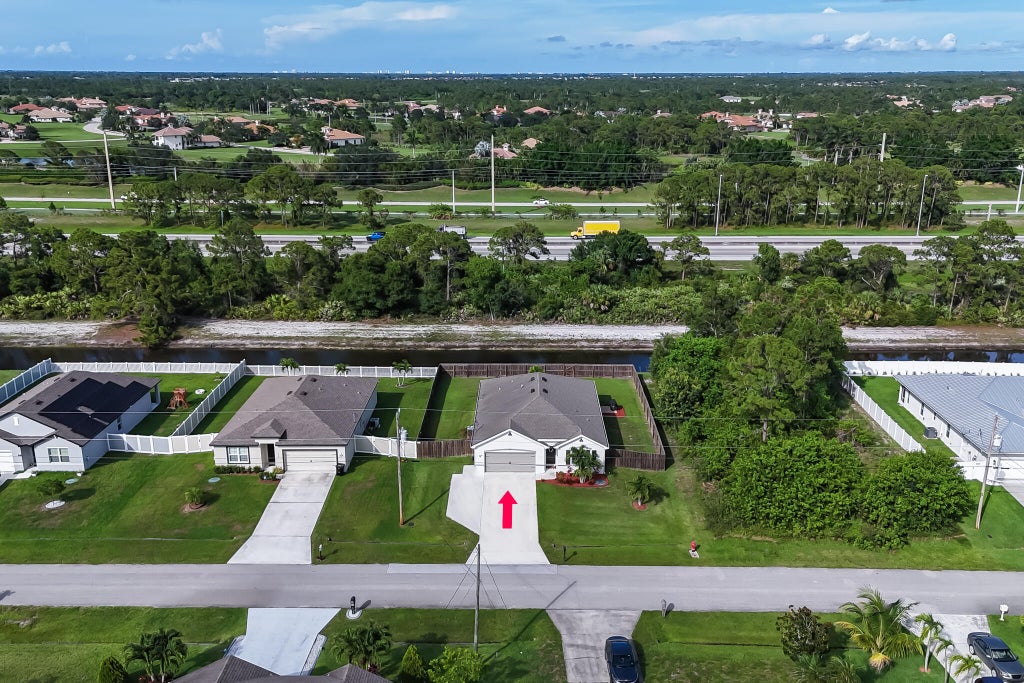 Photo of 290 SW Ridgecrest Drive, Port Saint Lucie, FL 34953 (MLS # R11099350)