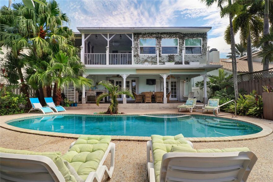 Motivated seller! Move-in ready or fix and flip! Two-story waterfront pool home in the luxurious Riviera Isles. Located in the gated Las Olas Isles area, with 50 feet of canal frontage and no fixed bridge dockage — ocean access is just minutes from the inlet. NO HOA.